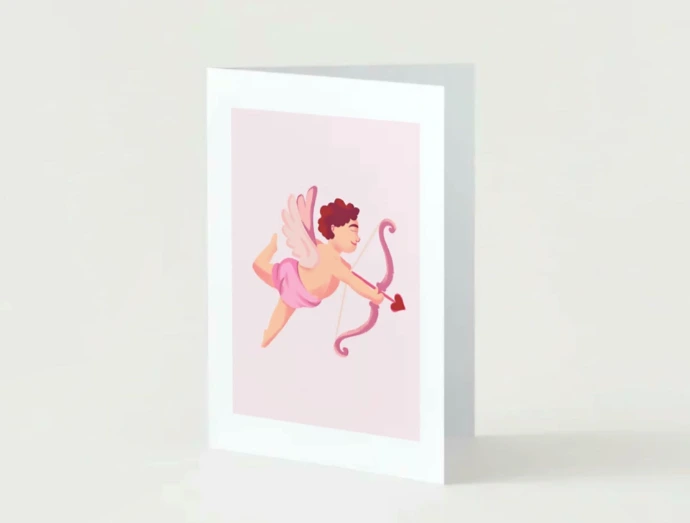 Carte de St. valentin avec un cupidon dessus, représentant l'amour.