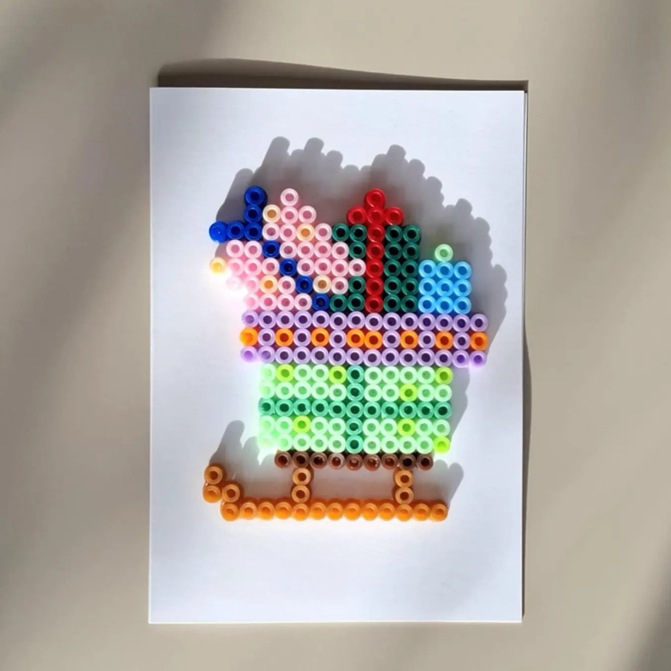 Carte Luge de cadeaux en perle